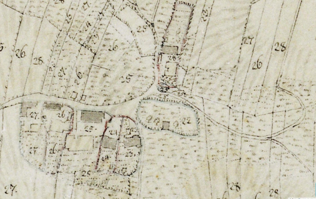 Ein altes Stadtplan von einer Stadt mit zahlreichen Geb"uden, Stra{\ss}en und Text, der eine vorgeschlagene Entwicklung am unteren Rand anzeigt.