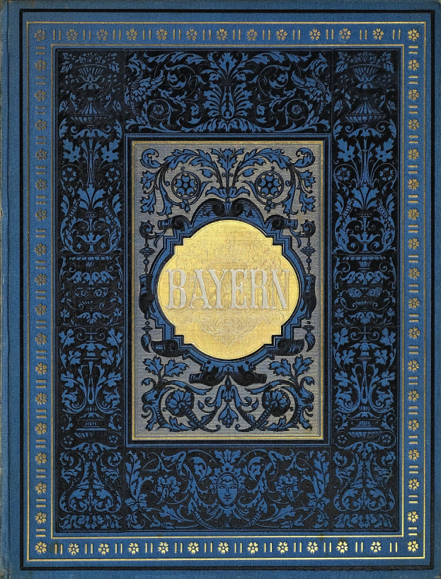 Ein blau-goldenes Buch mit der Aufschrift "Bayern", das mit detaillierten Verzierungen geschmückt ist.